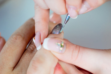 nail care and manicure in a nail salon - 240086130