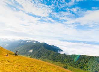 Obraz premium photographer take a photo on the top of mountain at Doi Mon Jong, Chiang Mai, Thailand