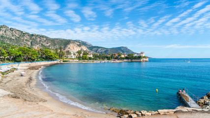 Landscape with amazing beach Baie des Fourmis, Beaulieu sur Mer,  Cote d'Azur, France - obrazy, fototapety, plakaty