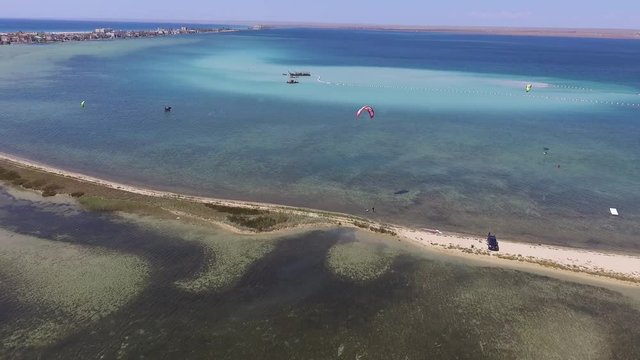 Kite surfing on Donuzlav lake. Mirny. Crimea. August 2018. Aerial drone view.