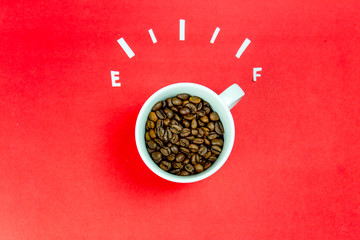 coffee is a fuel concept - a cup on a red background