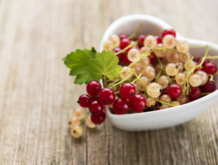 red currants in bowl in the heart shape