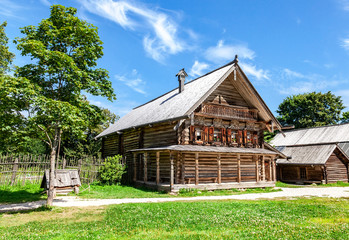 Fototapeta na wymiar Traditional russian old wooden house in the village