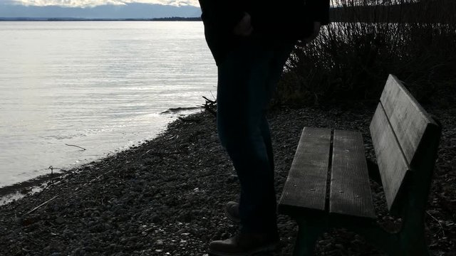 Mann am Ufer, Ammersee, Bayern