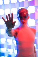 The man in white works on a virtual screen