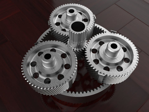 3D render - gear assembly on wooden background