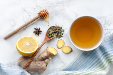 Healthy herbal tea on marble table. Top view. 