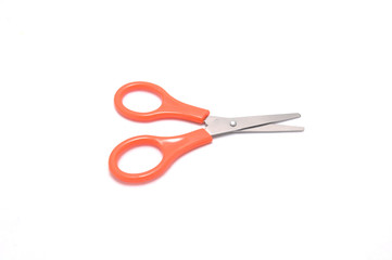 Scissors on white background close up