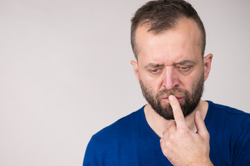 Confused focused serious man thinking