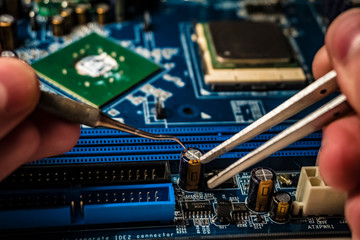 Work on the repair of motherboards and microcircuits.