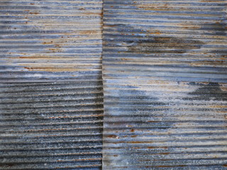 rusty zinc wall background,old zinc roof,rusty metal wall background,texture of iron