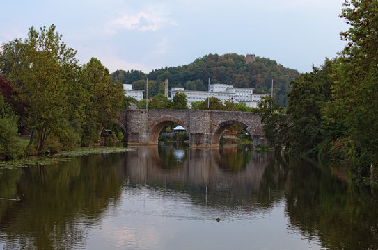Beautiful landscape view of ancient stone bridge over Lahn River in Wetzlar, State of Hesse, Germany