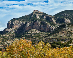 scenic view of mountains landscape with autumn foliage colors