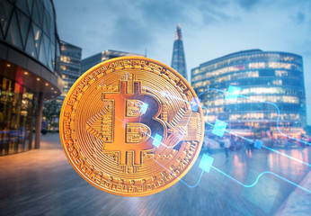 bitcoin against skyscrapers - futuristic smart city - cryptocurrency concept