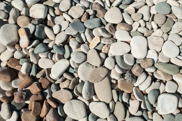 Beach round boulder stone background