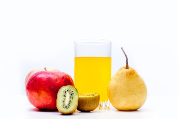 different fruit and juice or smoothie in a glass