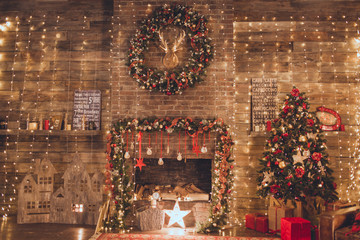 Christmas living room with fire place and garland lights
