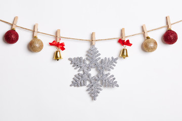 Christmas Decoration Hanging with Robe on White Background.Flat Lay,Top View