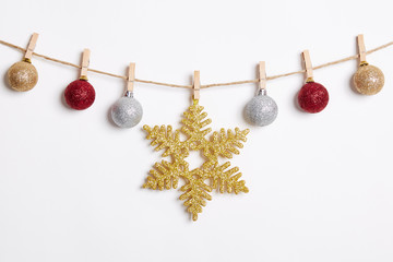 Christmas Decoration Hanging with Robe on White Background.Flat Lay,Top View