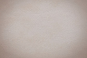 Light beige paper background, old off white paper. Textured sheet from an old book. Horizontal image.