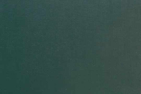 Green malachite textured background with grid pattern and white dots. Canvas of old book cover. Toned image