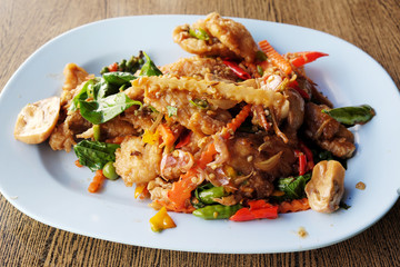 Spicy fried fish fillets with herbs