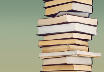 Collection of old books  on background