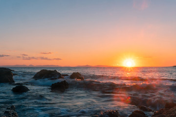 Fototapeta na wymiar warm summer sunset at the sea
