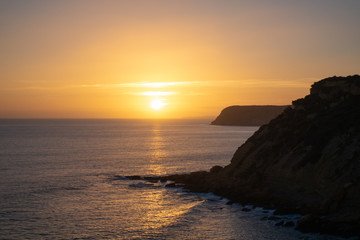 Sonnenuntergang an Steilküste