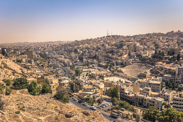 Fototapeta na wymiar Amman - September 29, 2018: View of central Amman from the Citadel viewpoint, Jordan
