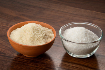Food: Closeup of  White and Brown Sugar Isolated on Wooden Background