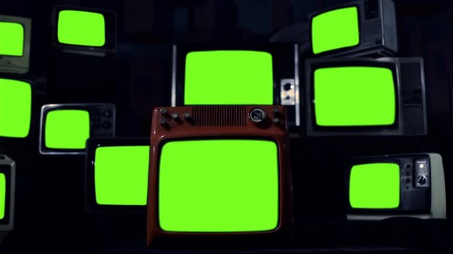 Vintage TVs Turning On Green Screens. Night Tone. You can replace green screen with the footage or picture you want with &ldquo;Keying&rdquo; effect in AE  (check out tutorials on YouTube).