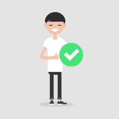 Young male character holding a green accepted sign. Flat cartoon illustration