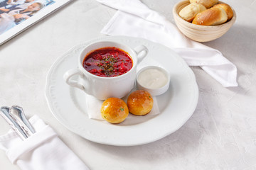 Red soup for lunch on the table