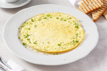 Omelette, fried eggs for breakfast