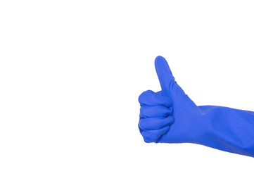 Blue glove for cleaning on a female hand shows thumb up. The concept of cleanliness.