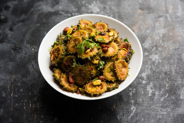 Cooked bitter Melon/gourd or Karela Sabzi served in a bowl. Scientific name of this healthy...