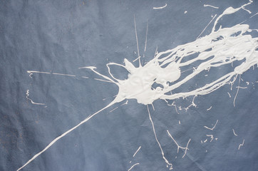 White blemish on the gray background