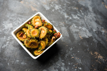 Delicious bitter melon curry, a healthy food from India. selective focus