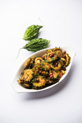 Delicious bitter melon curry, a healthy food from India. selective focus