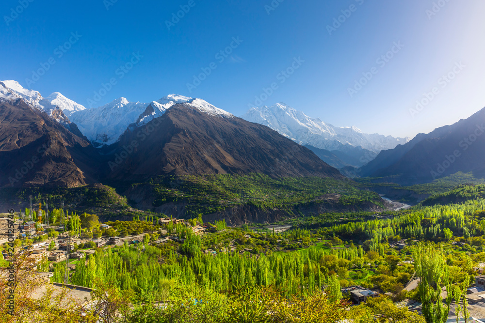 Wall mural scenic view of hunza valley in summer between the karakoram mountain range in pakistan