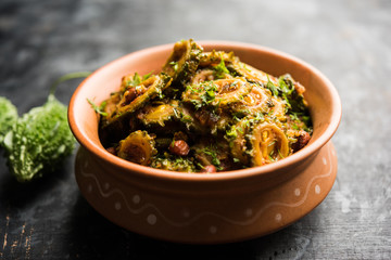 Delicious bitter melon curry, a healthy food from India. selective focus