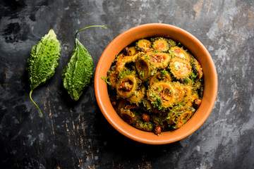Delicious bitter melon curry, a healthy food from India. selective focus