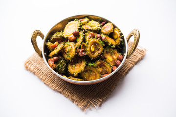 Delicious bitter melon curry, a healthy food from India. selective focus