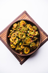 Cooked bitter Melon/gourd or Karela Sabzi served in a bowl. Scientific name of this healthy...