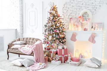 Christmas living room with a christmas tree and presents under it