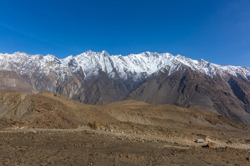 Naklejka premium Landscape of snow capped mountain range. A view from the glacier, Babusar Pass, Khyber Pakhtunkhwa, Gilgit Baltistan, Northern Pakistan.