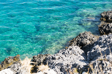 Beautiful turquoise sea with rocks  beach  , seascape