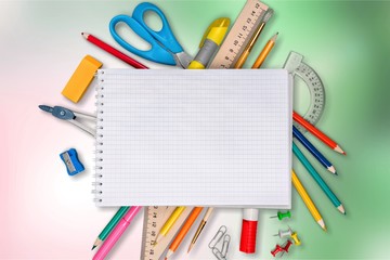 Assortment  of School supplies on  background