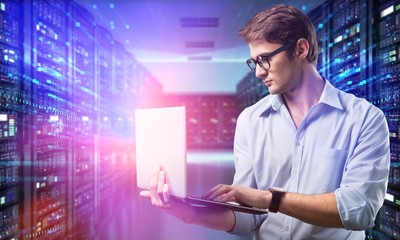 Man works in datacenter.